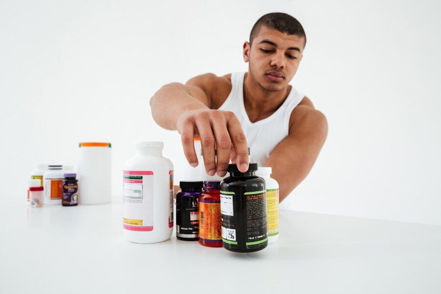 “Protein supplements for men including whey, plant, and casein powders for muscle recovery and strength.”